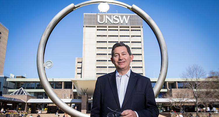 Professor Ian Jacobs in front of UNSW Library
