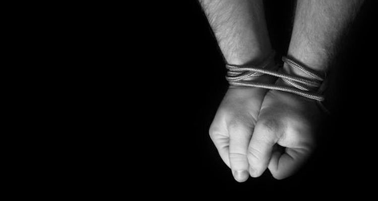 hands tied with rope