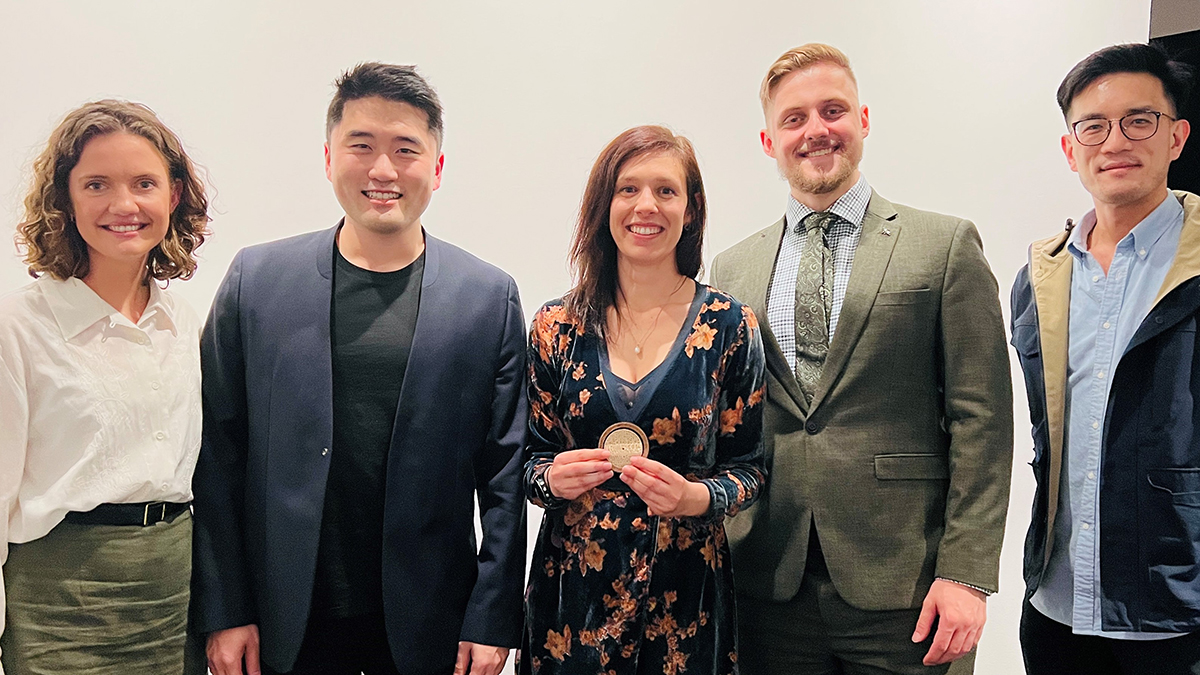 A group of five Architect's Medallion winners, showing two women and three men, with UNSW winner Samantha Rich at the centre