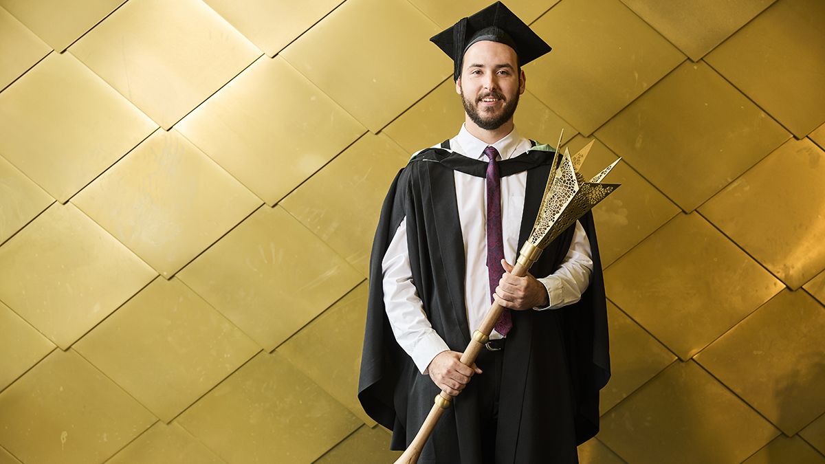 Noah Jugow with the new ceremonial he designed