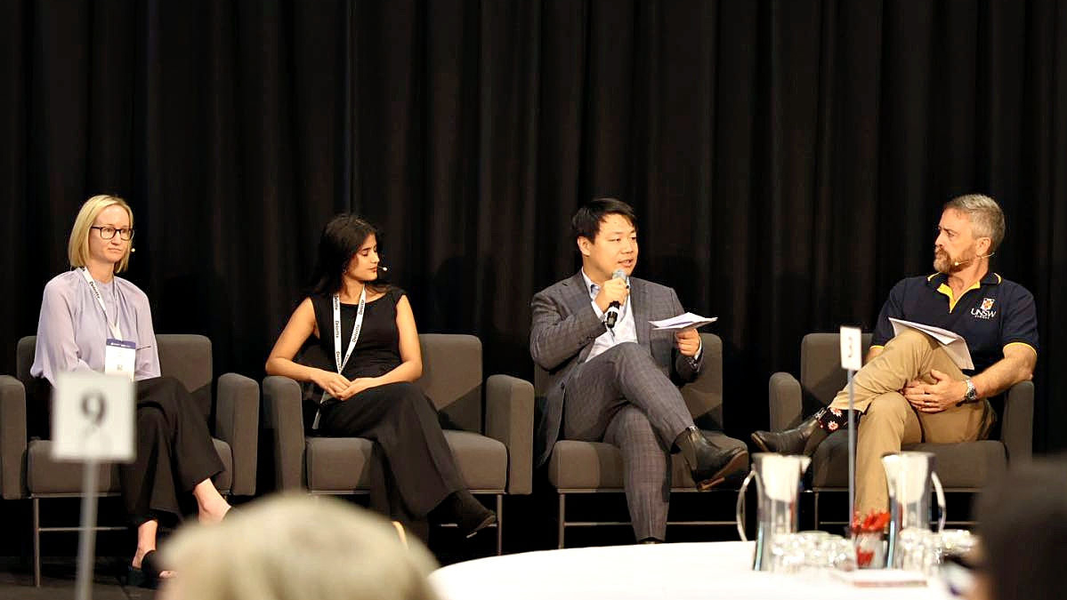 Professor Attila Brungs and panelists at UA Summit
