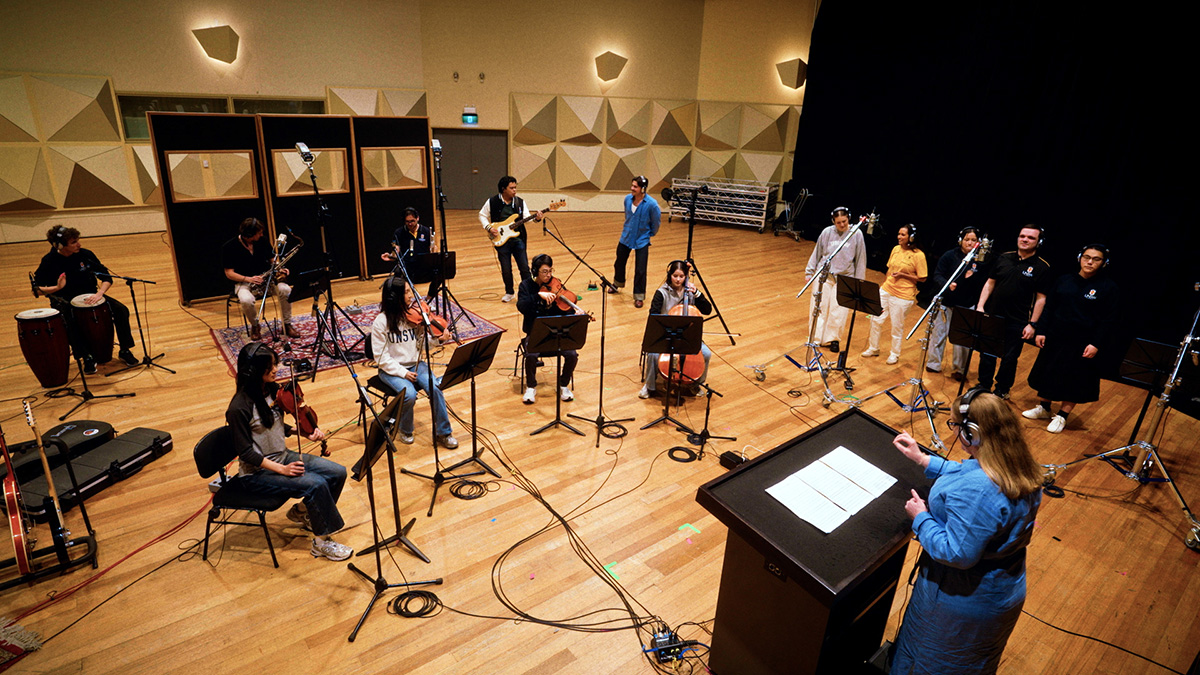 A music ensemble in a large recording space
