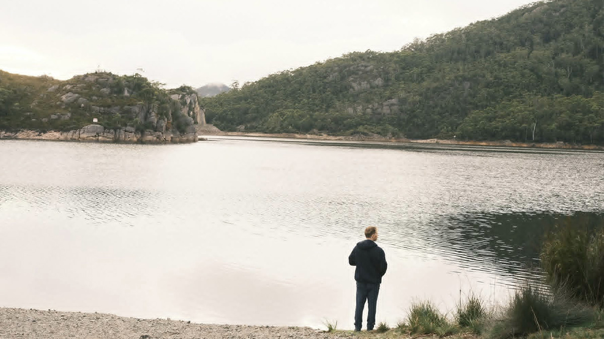 Man near lake