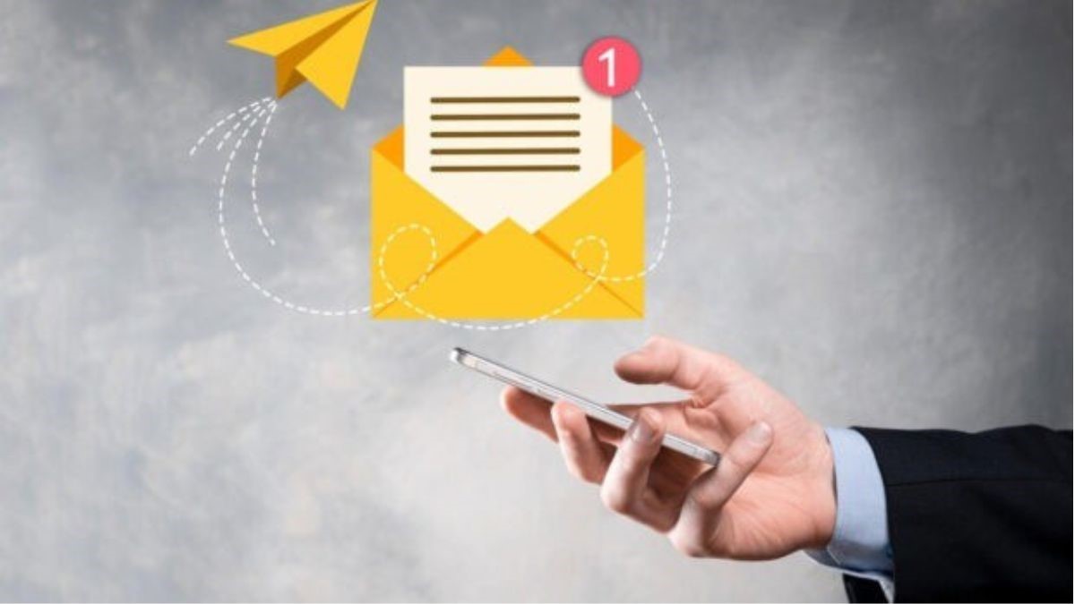 A hand reaching out to an email icon