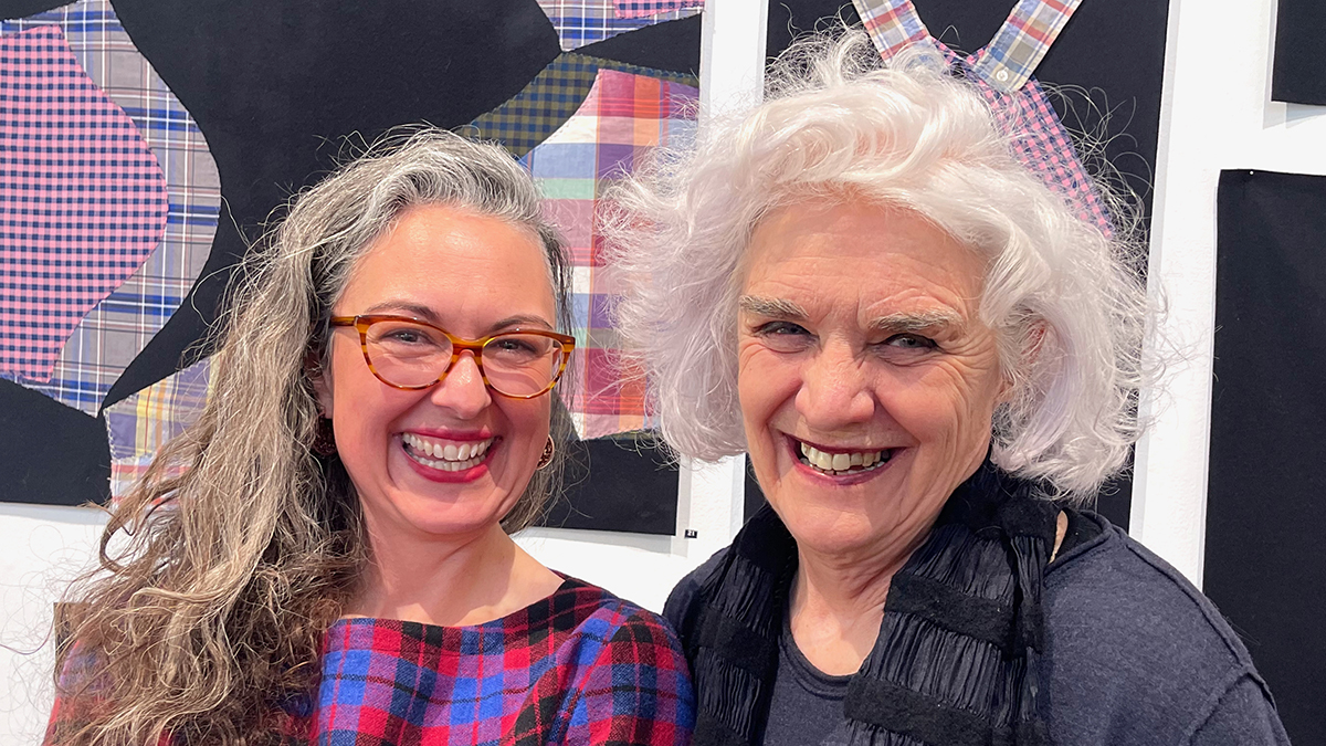 Two women Emma Peters and Liz Williamson smiling at the camera