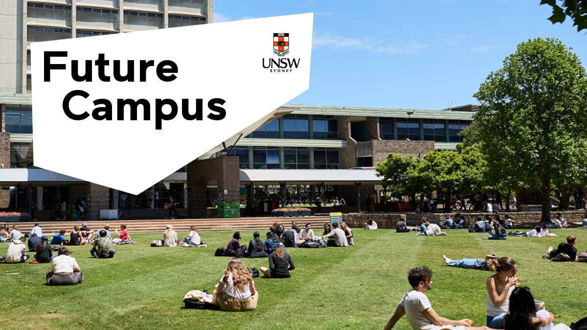 View of library lawn with students sitting