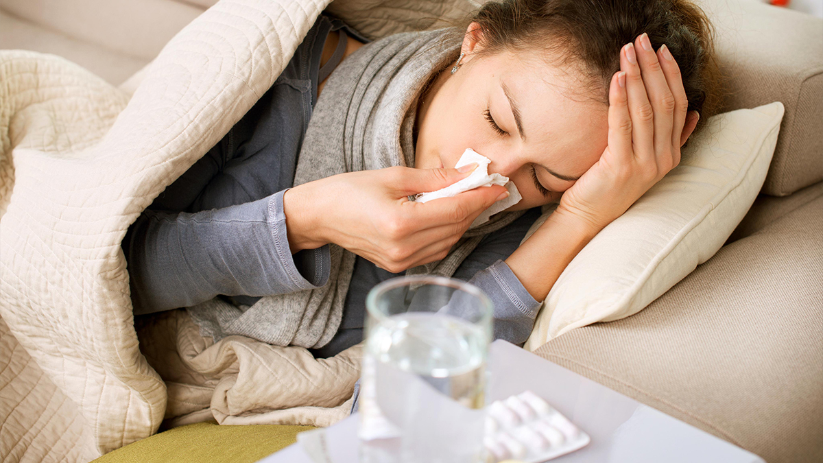 Woman suffering from the flu