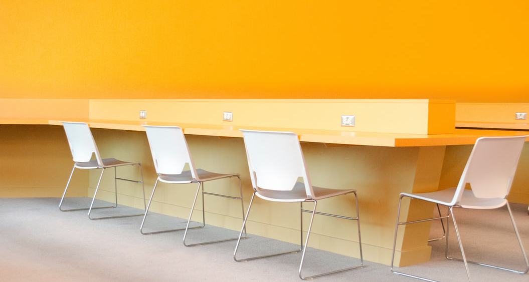 Chairs with a yellow background