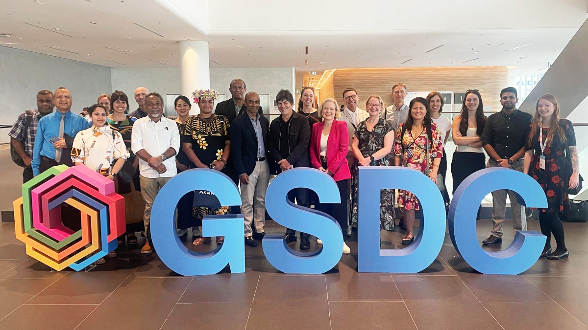 Group of people celebrating the Global Sustainability Development Goals