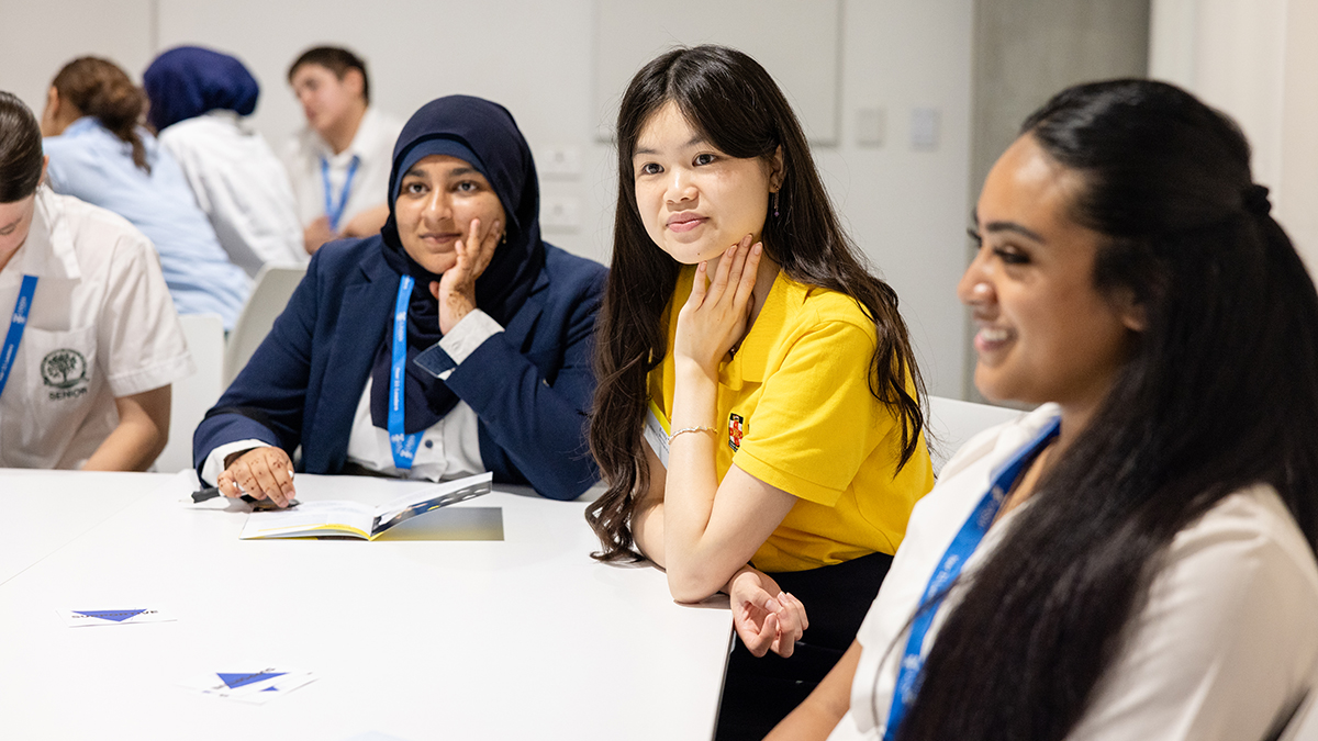 Three girls in a classroom