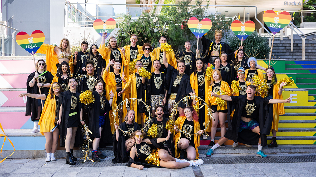 A group of people in costume posed on the Basser Steps