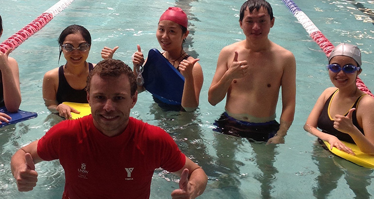 students learning to swim