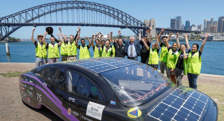 solar car next to Sydney harbour bridge
