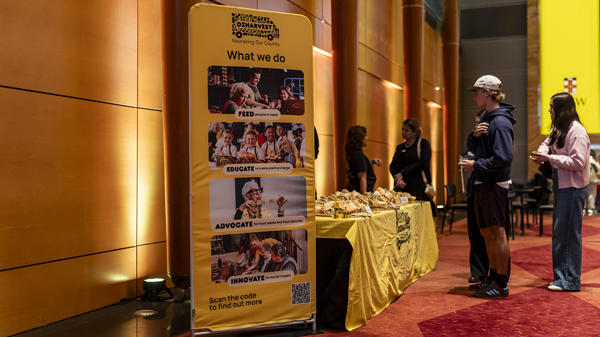 A banner for OzHarvest in Leighton Hall