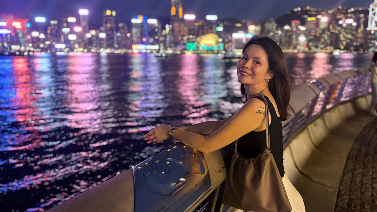 Alisa Tian standing beside a river