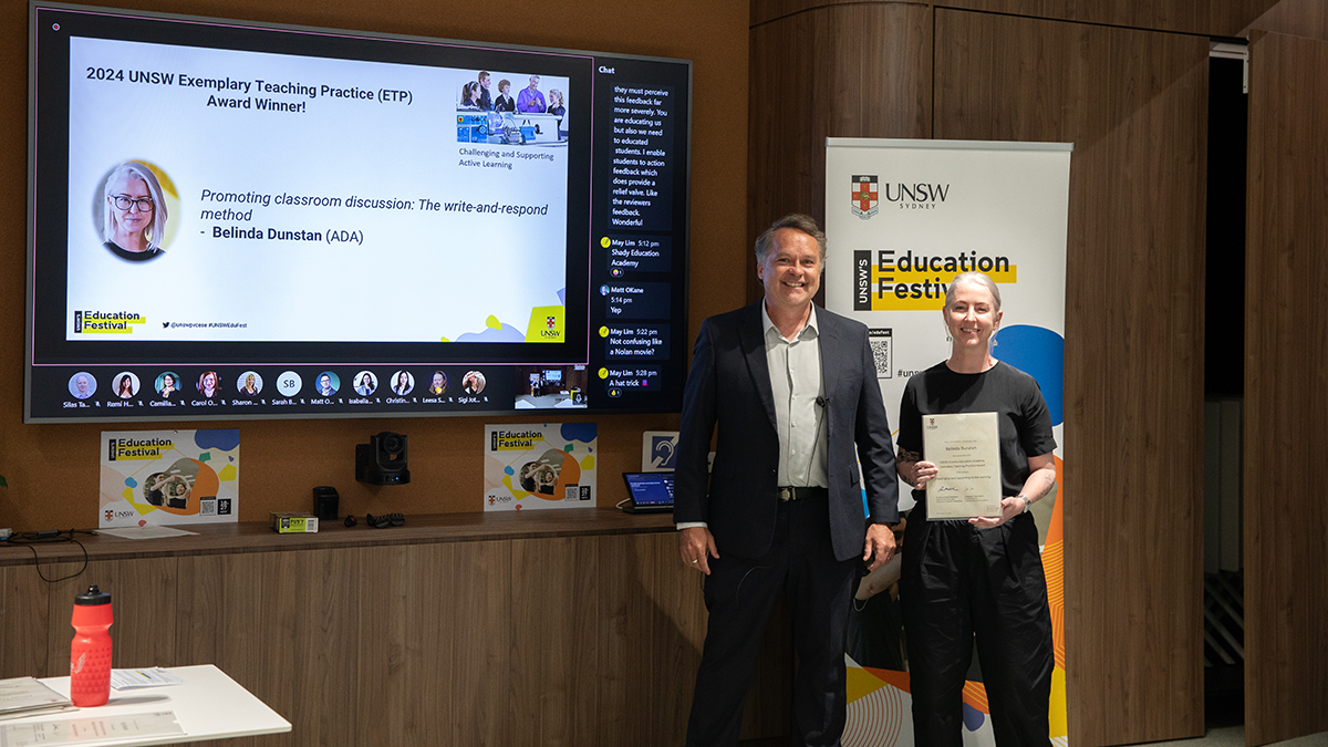 Dr Belinda Dunstan receiving an Exemplary Teaching Practice Award from Scientia Education Academy Fellow Professor Peter Heslin