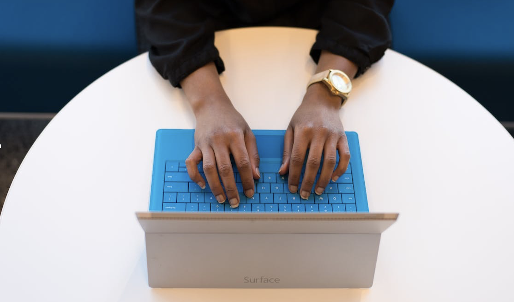 Hands on a laptop computer