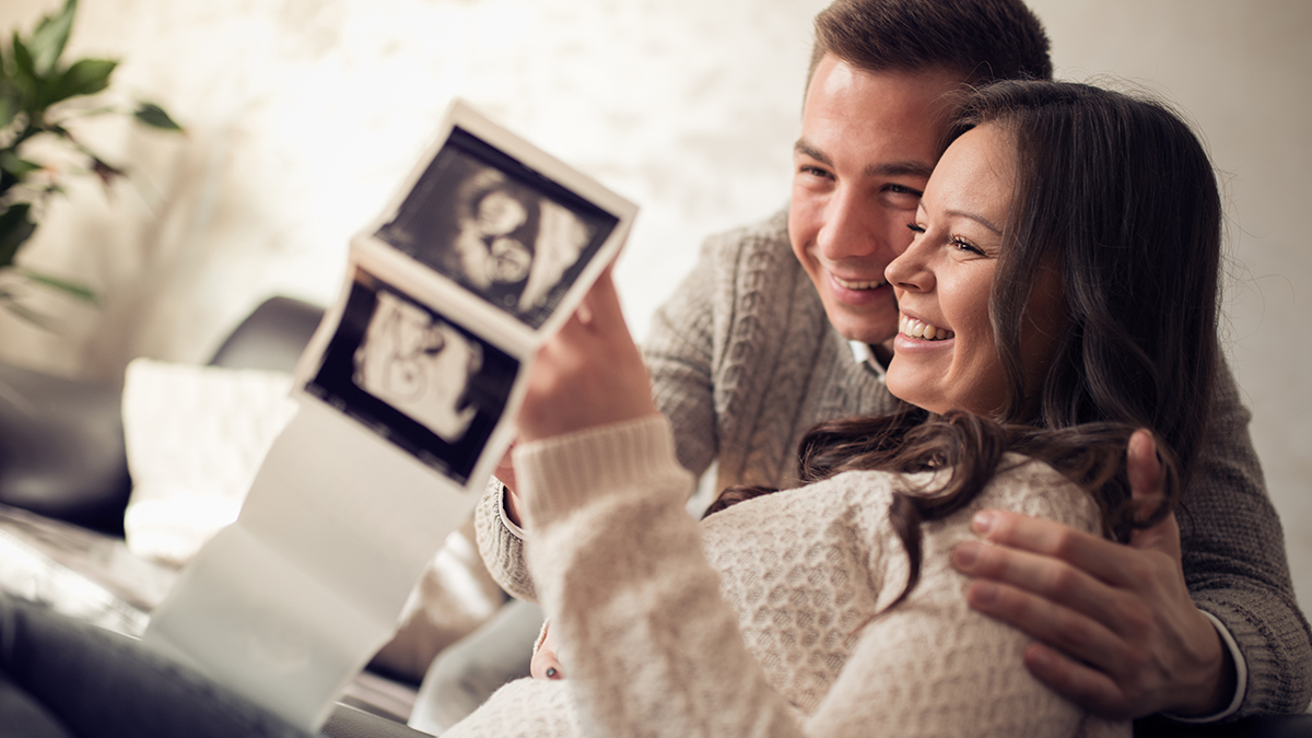 Couple looking at photo