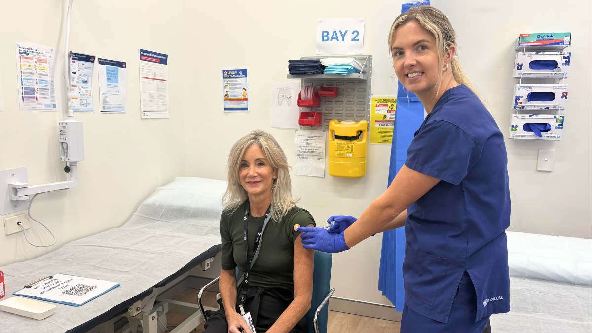 Nurse Shauna Cagney vaccinating Dr Shona Dutton, Director of Student Wellbeing & Sport, Pro Vice-Chancellor Student Success Office.