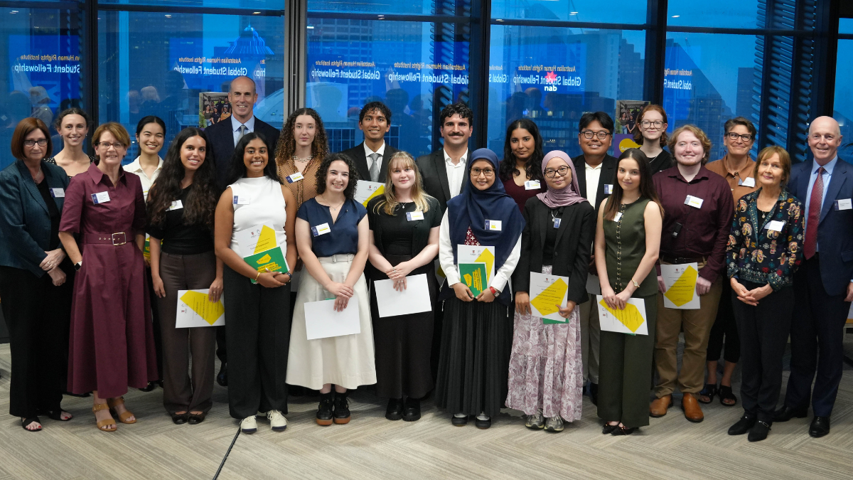 Chancellor Warwick Negus, Deputy Vice-Chancellor (Education & Student Experience) Professor Sarah Maddison, Professor Justine Nolan, Director of the Australian Human Rights Institute, and Professor Andrew Lynch, Dean of Law & Justice, celebrate with Global Student Fellowship recipients.
