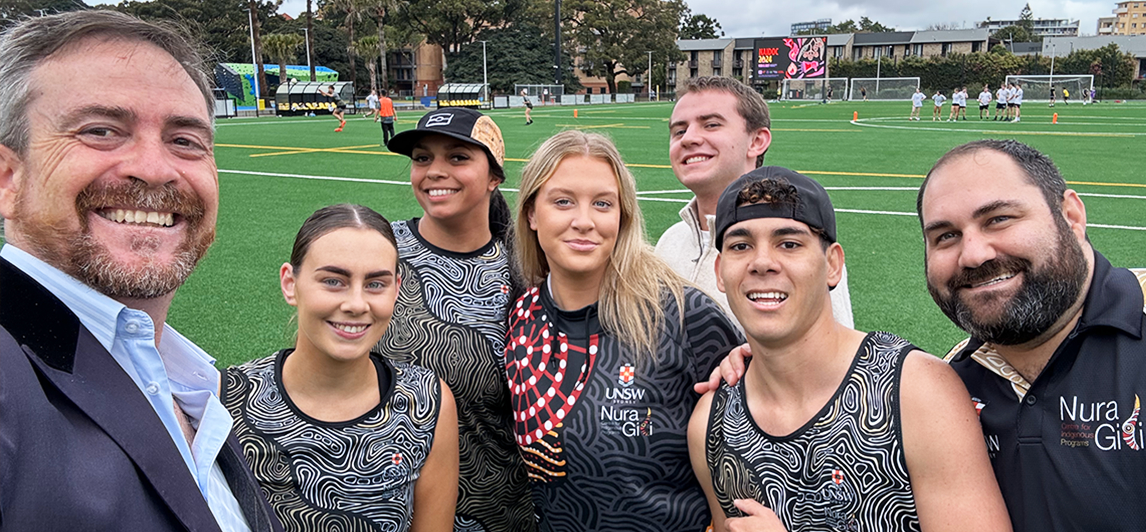 Scott Parlett, Director, Nura Gili (right) and UNSW Indigenous Nationals team members Xhana Tishler, Keeley-che Cain, Sophie Martin, Tim Walker and Jayden Kennedy