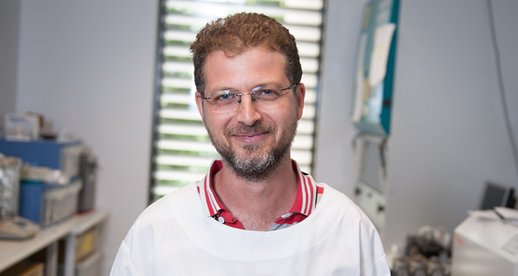 Dr Orazio Vittorio looking at camera