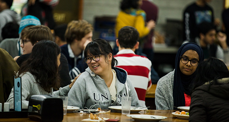 students enjoying pre dawn meals