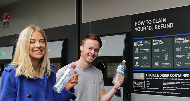 Students using the Return and Earn reverse vending machine