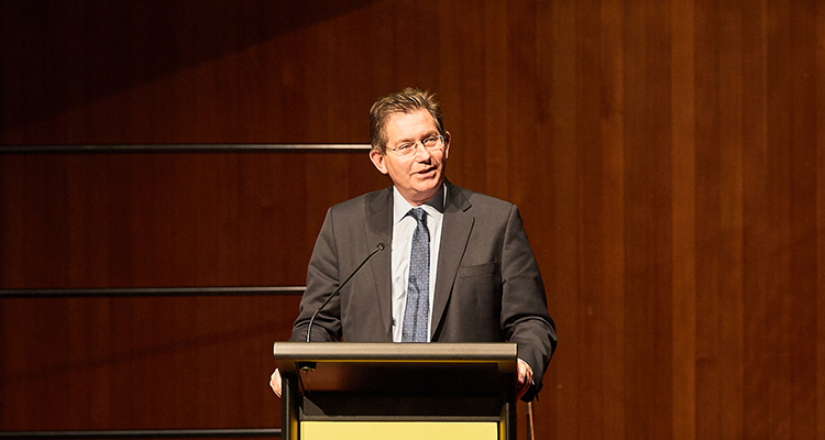 Professor Ian Jacobs speaking at an event