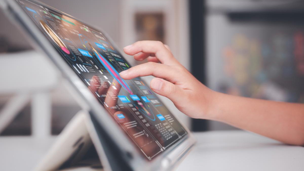 Close up of a hand on an iPad screen