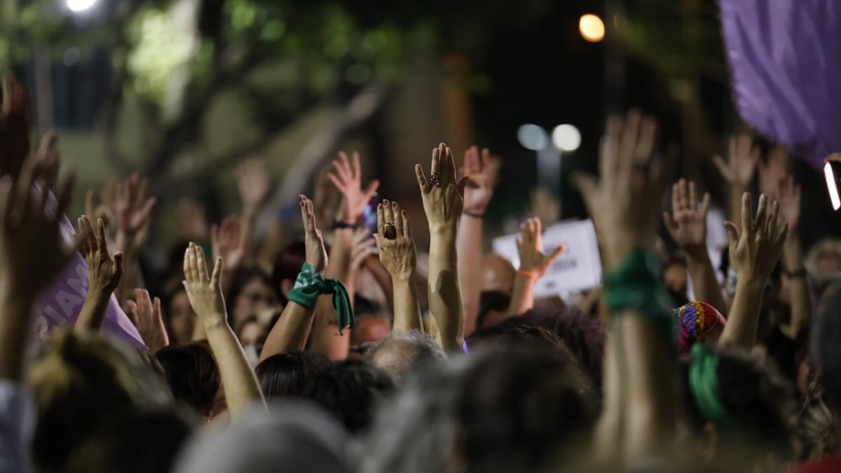 Hands raised in a crowd