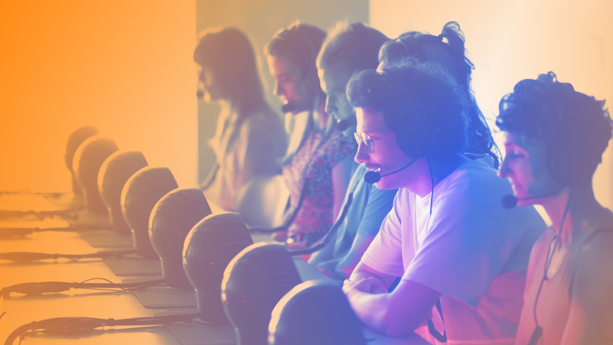 A row of people with headsets on