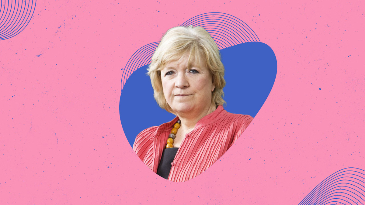 Polly Toynbee against a pink background