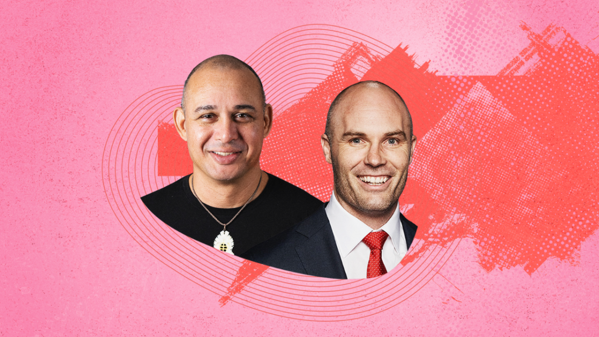 Two men against a pink and red background
