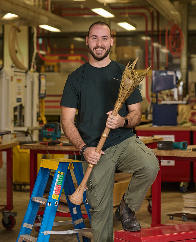 Noah with the new mace during the final stages of fabrication.