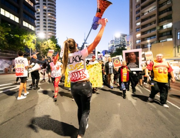 Vanessa Turnbull-Roberts leads a march in Sydney. Image: John Janson-Moore