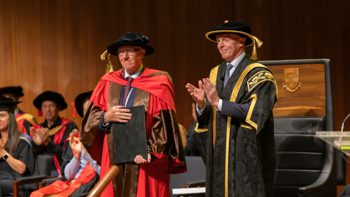 Left The Hon. Keith Mason AC KC, right UNSW Chancellor Warwick Negus