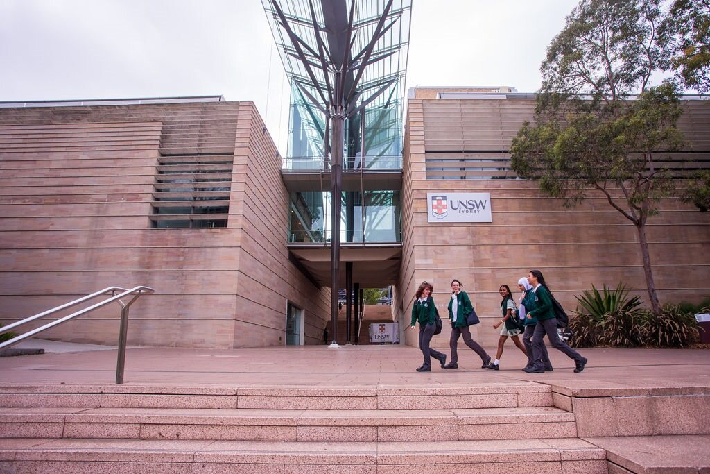 High school students walking by the Scientia Building