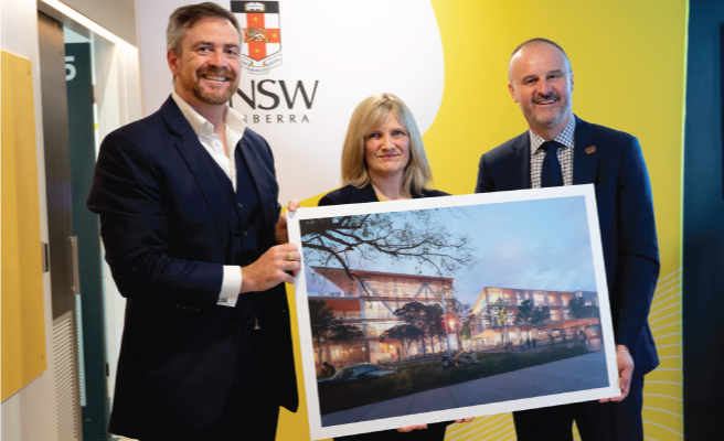 Professor Attila Brungs, Vice-Chancellor and President, Professor Emma Sparks, Canberra Dean and Rector, and Andrew Barr, the ACT Chief Minister holding the artists' impression of the build.