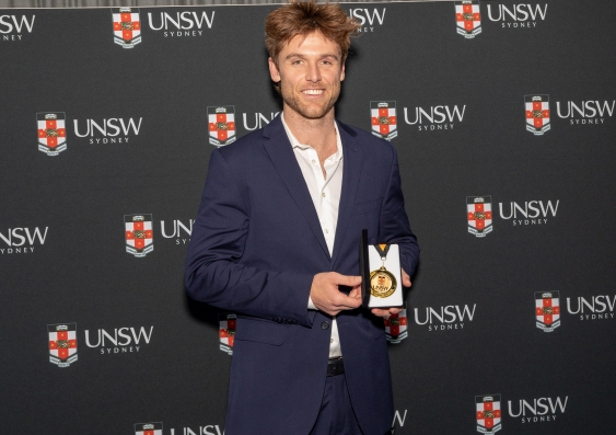 Man holding trophy