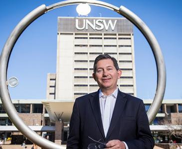 Professor Ian Jacobs in front of UNSW Library