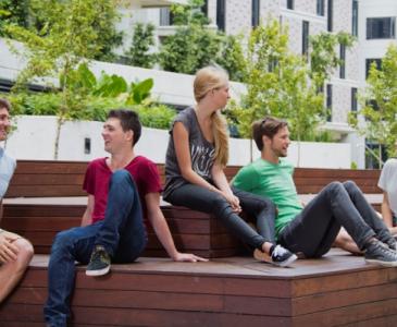 students hanging around campus