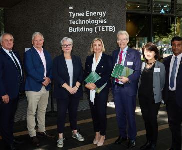 Hon. Penny Sharpe MLC, Minister for Climate Change, Minister for Energy, Minister for the Environment, and Minister for Heritage with a group of people at the launch of a report on low carbon future