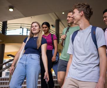 Students walking down stairs