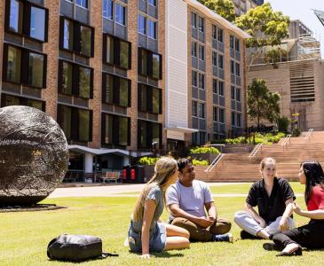 Students sitting on lawn