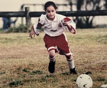 Jodie Pestan playing soccer aged 6