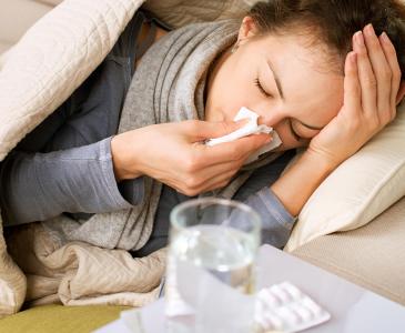 Woman suffering from the flu