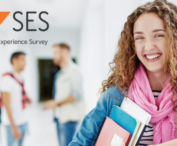 Photo of female student with long curly hair with the SES logo