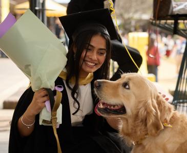 graduate and dog