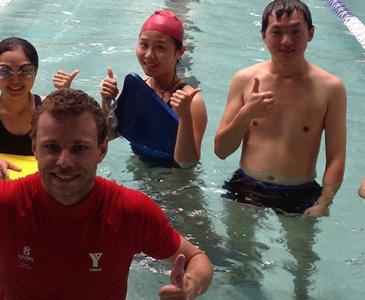 students learning to swim